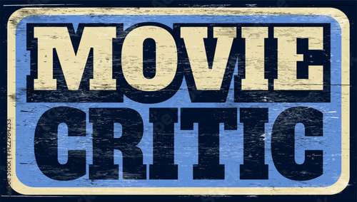 Aged retro movie critic sign on wood