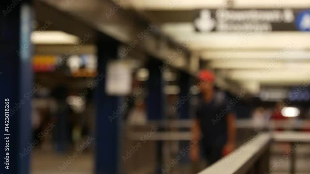New York City, Manhattan. Defocused subway station interior, underground metropolitan transfer. Public metro transport. Railway change hub, passenger traffic junction. People in NYC, United States. New York City, Manhattan. Defocused subway station interior, underground metropolitan transfer. Public metro transport. Railway change hub, passenger traffic junction. People in NYC, United States.
