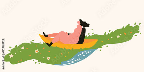 Woman relaxing in kayak on a river surrounded by lush greenery.