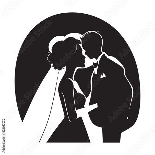 Silhouette of groom gently kissing bride’s forehead