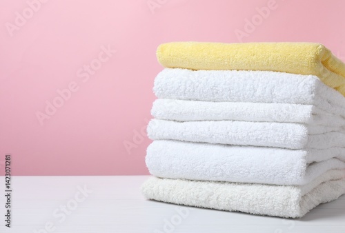 Stack of bath towels on the table