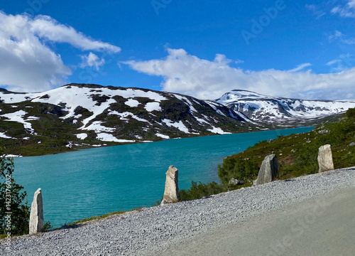 The Norwegian Scenic Route Gamle Strynefjellsvegen with stone guard markers and mountain views