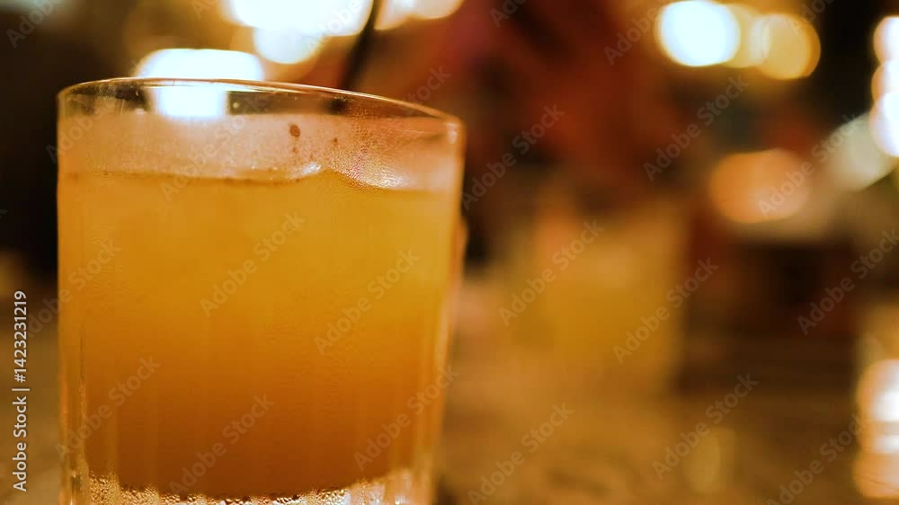 Vibrant Cocktail in a Lively Bar Setting Vibrant Cocktail in a Lively Bar Setting