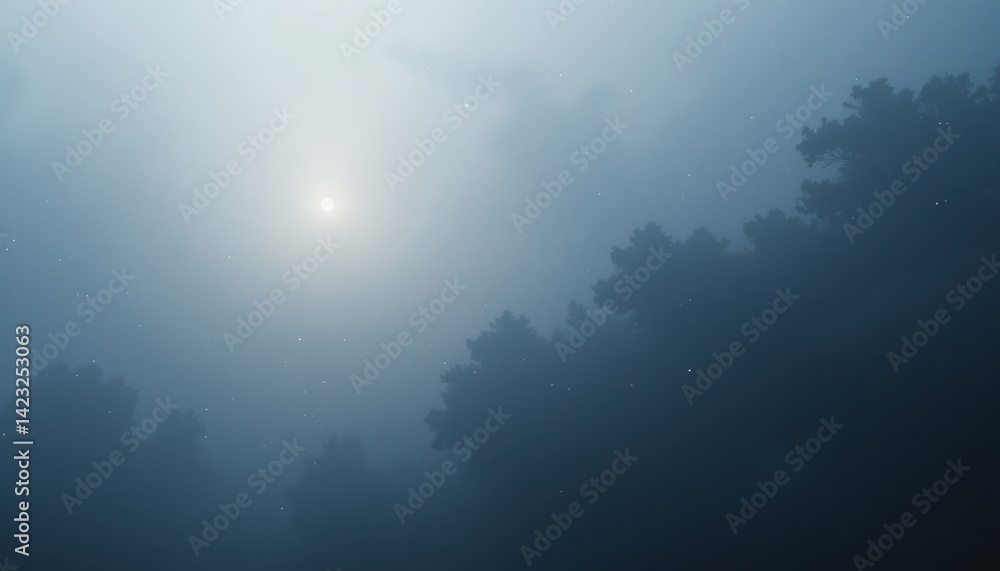 Mysterious fog envelops forested landscape at dawn captured in atmospheric nature photography Mysterious fog envelops forested landscape at dawn captured in atmospheric nature photography