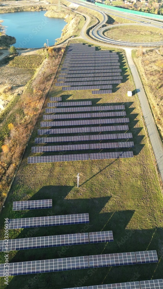 Vertical aerial photo of solar panel rows