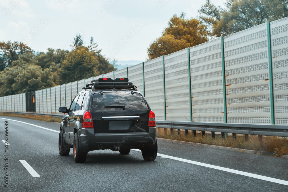 Crossover with gear and toolbox on roof rack