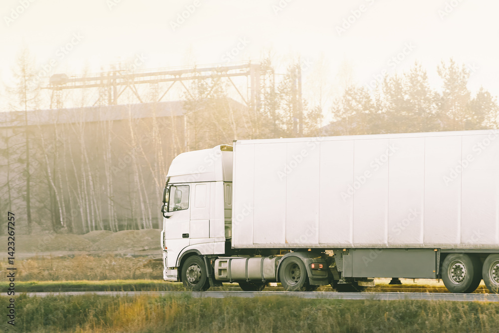 Heavy vehicle transporting goods on highway