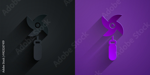 Paper cut Pinwheel toy icon isolated on black on purple background. Windmill toy icon. Paper art style. Vector