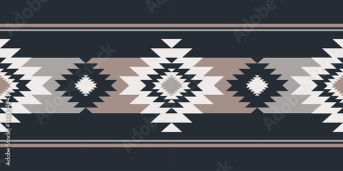 Beige color southwestern navajo geometric pattern. Vector ethnic southwestern geometric seamless pattern. Modern native American pattern use for textile border, rug, table runner, tablecloth, etc.