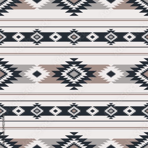 Modern beige color aztec southwest pattern. Vector aztec southwestern Navajo geometric seamless pattern. Ethnic geometric pattern use for fabric, textile, home decoration elements, upholstery, etc.