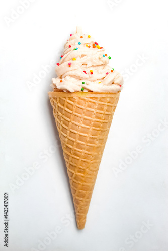 vanilla ice cream cone with sprinkles, isolated on white background
