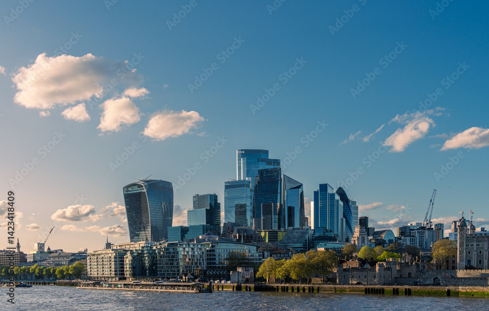 Fototapeta premium London skyline showing the city of london financial district and tower of london under a cloudy sky