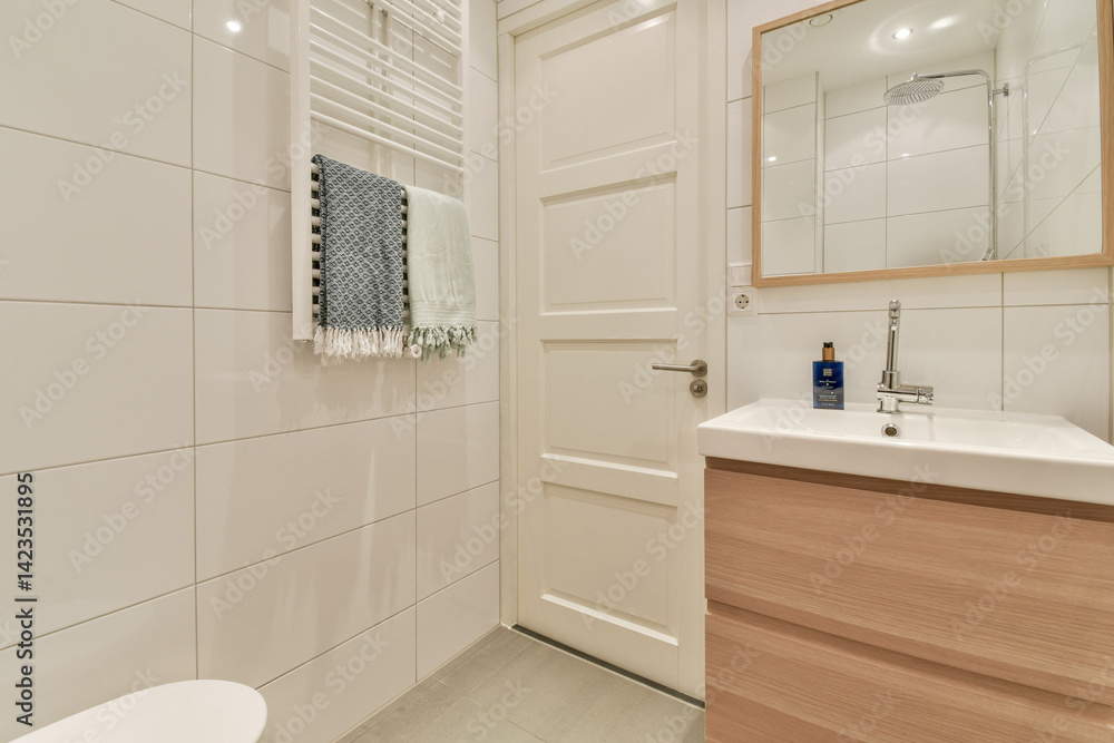 A stylish modern bathroom featuring elegant fixtures and a clean design. The light colors and minimalist decor create a serene atmosphere. A stylish modern bathroom featuring elegant fixtures and a clean design. The light colors and minimalist decor create a serene atmosphere.