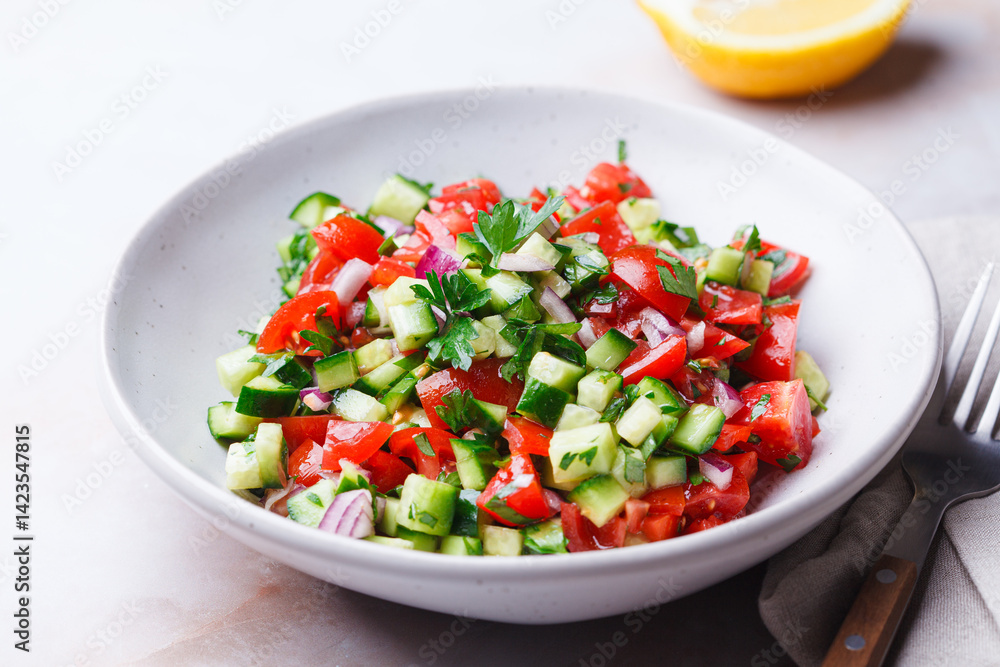 Vegetable salad with tomatoes, cucumbers, onions and parsley. Vegetable salad with tomatoes, cucumbers, onions and parsley.