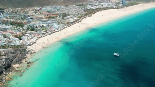 Wallpaper Mural White sandy beach and blue water in Morro Jable, south of Fuerteventura, Canary islands Torontodigital.ca