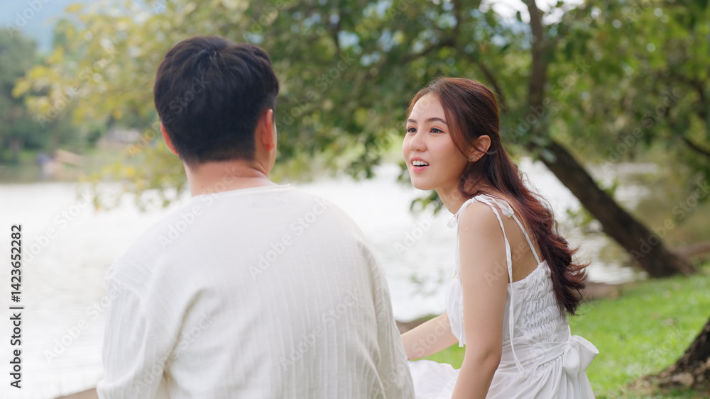 Young adult asia people happy lover flirt at public nature park falling in love desire kiss hug beloved care trust. Sweet asian lovers tender face to face man woman smile relax warm time date day. Young adult asia people happy lover flirt at public nature park falling in love desire kiss hug beloved care trust. Sweet asian lovers tender face to face man woman smile relax warm time date day.