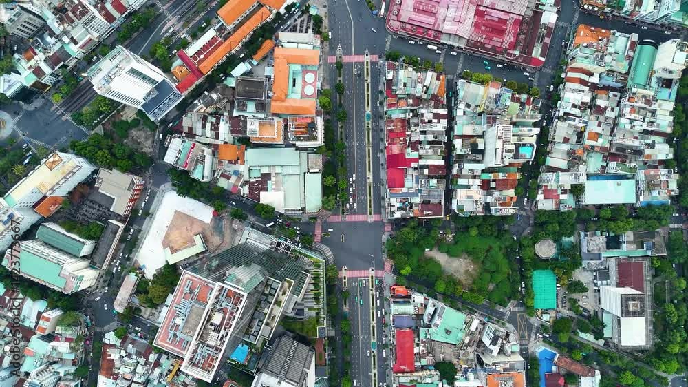 Aerial: roads and traffic during the day in Ho Chi Minh City, Vietnam, top-down drone shot Aerial: roads and traffic during the day in Ho Chi Minh City, Vietnam, top-down drone shot