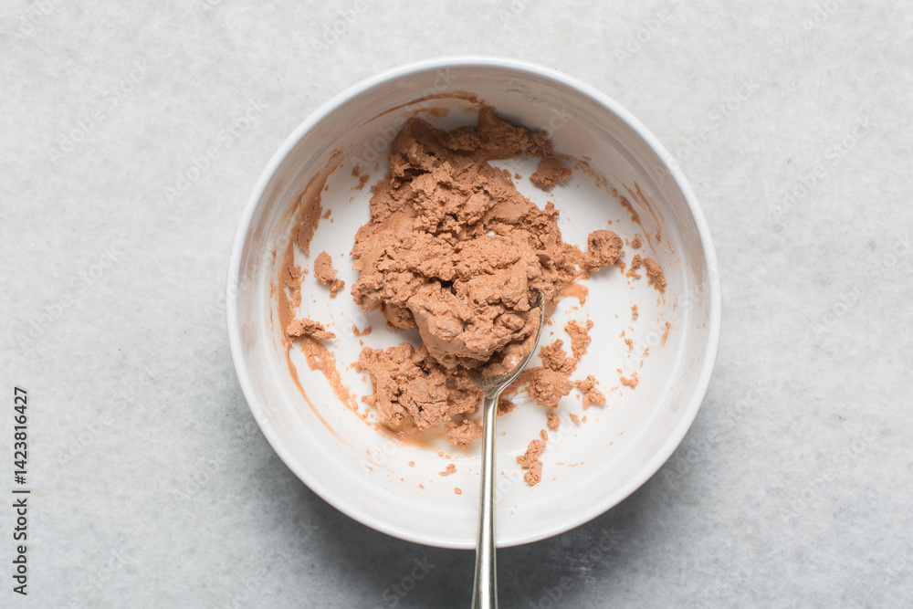Overhead view of nigerian akamu or pap paste, process of making akamu, flatlay of process of making nigerian akamu ogi pap or guinea corn pudding Overhead view of nigerian akamu or pap paste, process of making akamu, flatlay of process of making nigerian akamu ogi pap or guinea corn pudding