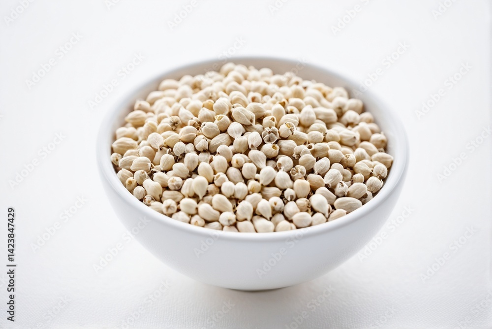 White Peppercorns on Light Background – Subtle Aromatic Spice for Fine Cuisine, Gourmet Cooking, and Minimalist Food Styling Concepts White Peppercorns on Light Background – Subtle Aromatic Spice for Fine Cuisine, Gourmet Cooking, and Minimalist Food Styling Concepts