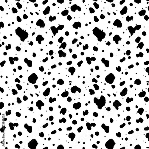 Seamless pattern of spotted skin on a white background spots 