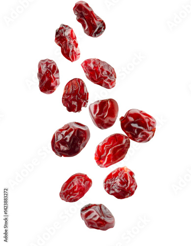 Falling dried cranberries isolated on transparent background with clipping path