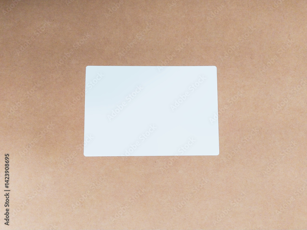 Blank label on rustic cardboard. Simple, clean image for delivery, shipping, or organization concepts. Space for textlogo. Versatile backdrop for presentations. Blank label on rustic cardboard. Simple, clean image for delivery, shipping, or organization concepts. Space for textlogo. Versatile backdrop for presentations.