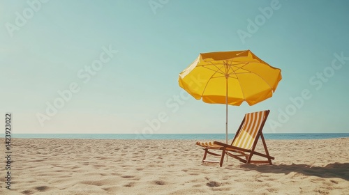 Relaxing beach setup with a striped deck chair and yellow umbrella casting shade on golden sand under a clear blue sky