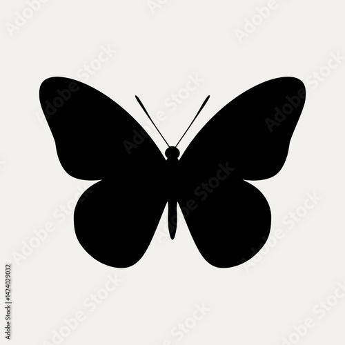Elegant Black Butterfly Silhouette Isolated on White Background