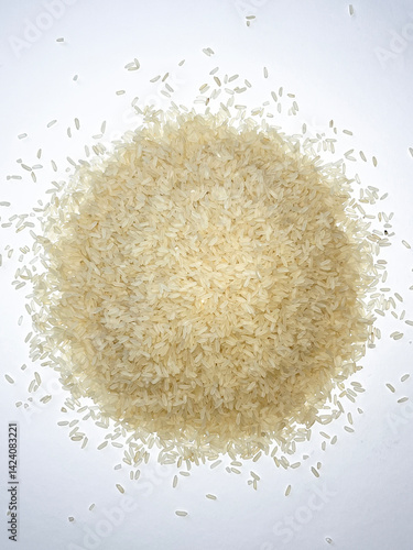 Pile of raw basmati rice isolated on white, top view