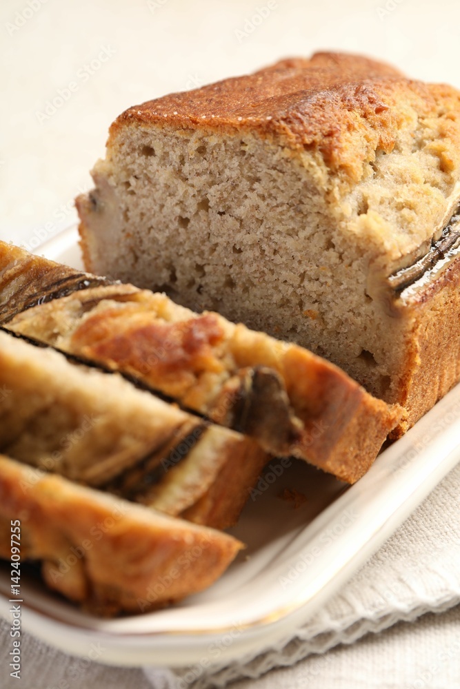 Pieces of banana bread on table, closeup Pieces of banana bread on table, closeup