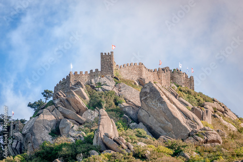 The Moorish Castle (or Castle of the Moors) sits isolated on the very top of Sintra's Hills, surrounded by incredible walls. In Sintra, Portuguese Riviera, Portugal.