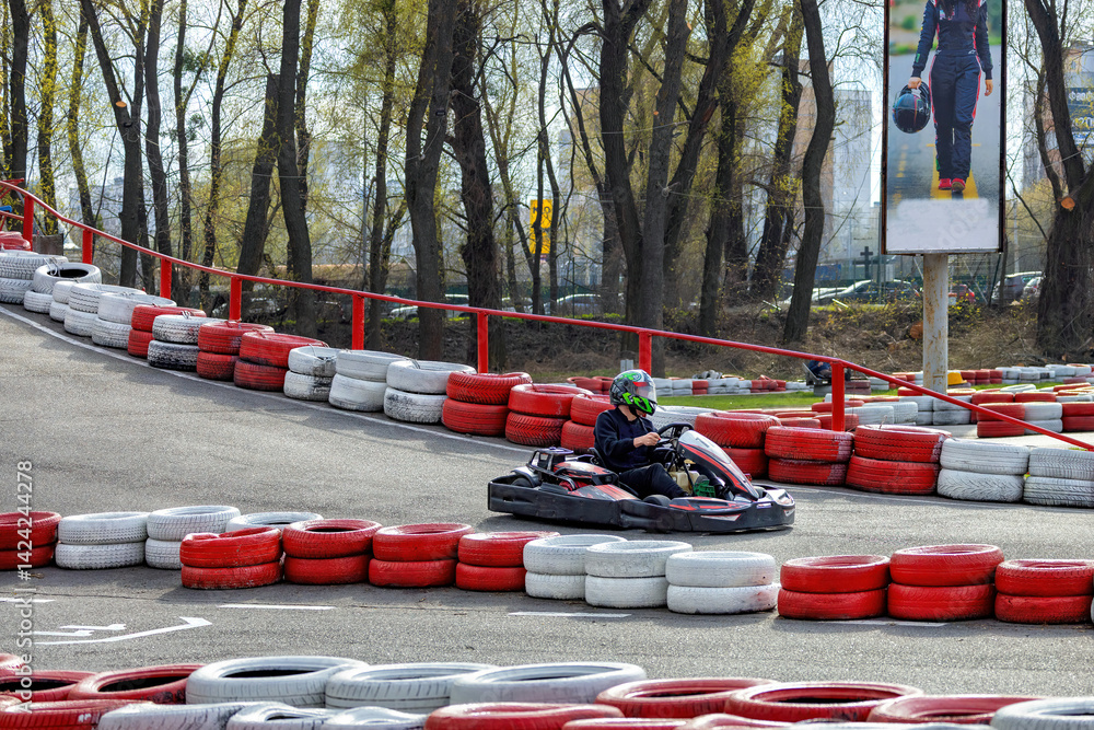 Excitement on the racing track while karting on a sunny afternoon