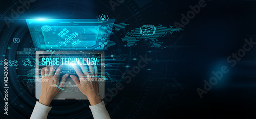 Fototapeta Naklejka Na Ścianę i Meble -  Man using a laptop with space technology on the keyboard is analyzing and developing various information about satellites, satellite communication, space mining, astrobiology, and space medicine.