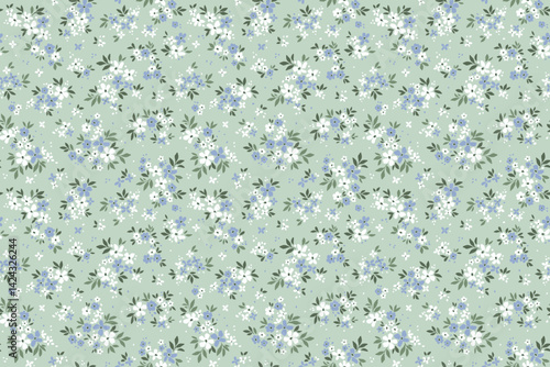 Retro floral pattern in small decorative flowers. Small blue and white flowers. Light blue background. Ditsy print. Floral seamless background ditsy pattern in small cute spring flowers. Stock print