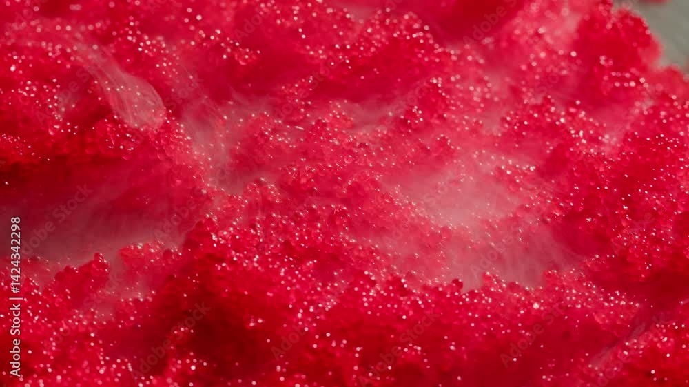 Tobiko, roe flying fish roe full frame macro close up, Sea of red caviar, supermarket shop fish food. Tobiko, roe flying fish roe full frame macro close up, Sea of red caviar, supermarket shop fish food.