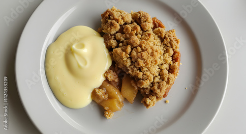 Delicious Apple Crumble Dessert Served with Sweet Cream Sauce on White Plate