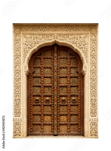 Traditional Indian wooden door with intricate carved arch and floral patterns