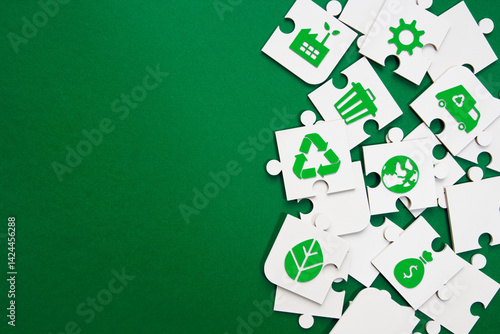 Environmental Puzzle Pieces with Green Icons and Copy Space. jigsaw puzzle pieces with green sustainability icons including recycling, globe, factory, and leaf on green background with copy space. 
