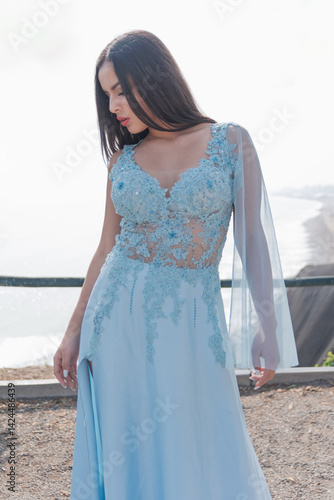 Peruvian, beautiful, young model taking photos in front of the sea, makeup, natural hairstyle, loose hair, landscape, green coast of Peru, Lima