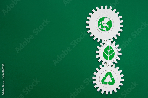 Vertical Environmental Gears with Green Icons. Three interconnected white cogwheels with green sustainability symbols. Environmental solutions concept. Sustainability concept. Eco-friendly concept