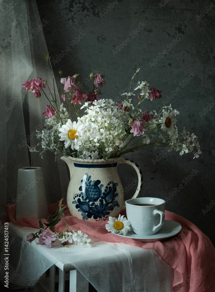 Delicate White Flowers Arranged in a Vintage Pitcher Sitting on a Charming Rustic Table