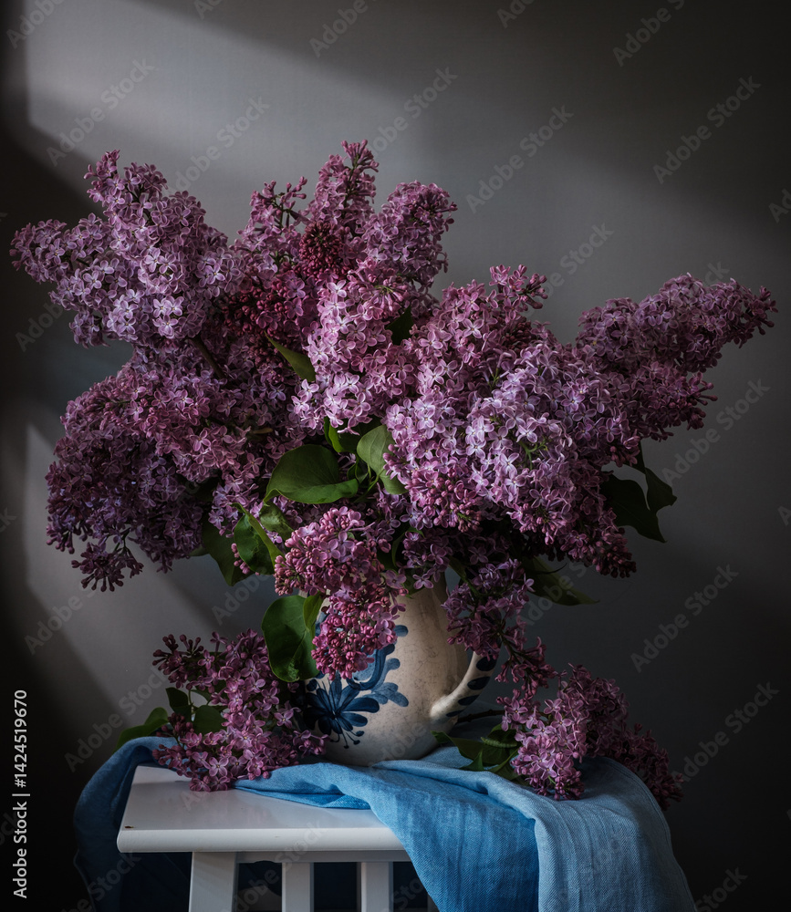 A Beautiful and Vibrant Lilac Bouquet arranged in a Wicker Basket.