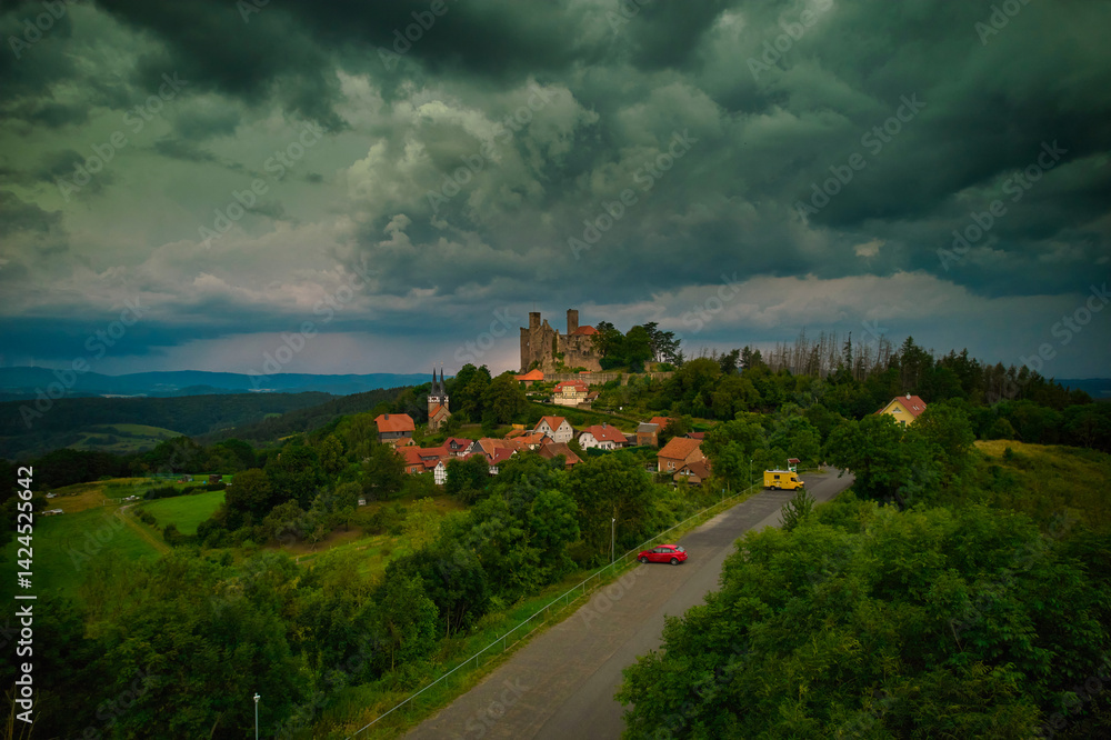 Stunning Aerial View of a Magnificent Ancient Castle Enveloped by Verdant Lush Landscapes. Hanstein castle, Germany.