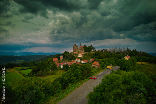 Obraz na płótnie Stunning Aerial View of a Magnificent Ancient Castle Enveloped by Verdant Lush Landscapes. Hanstein castle, Germany. w salonie