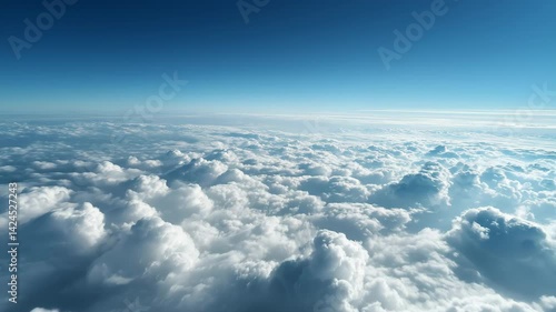 Flying above the clouds. Aerial view of clouds at sunrise. Traveling by air perfect background, 4k,beautiful blue sky with soft white clouds timelapse for abstract background