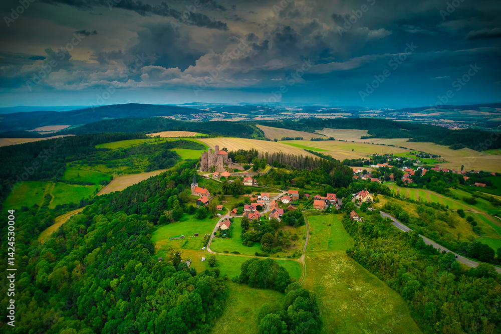 Stunning Aerial View of a Magnificent Ancient Castle Enveloped by Verdant Lush Landscapes. Hanstein castle, Germany.