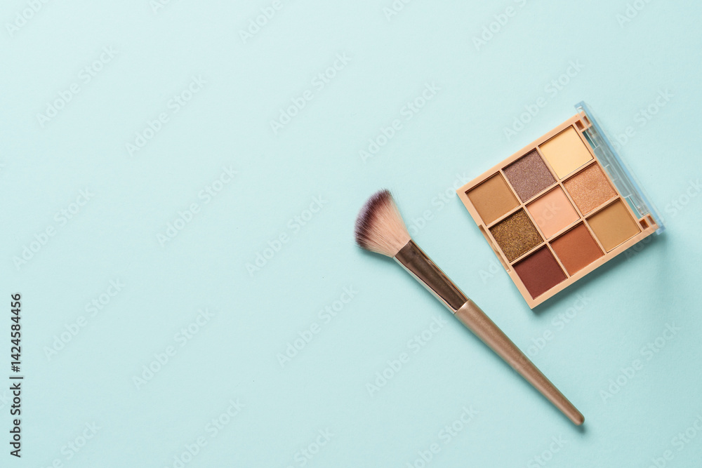 Make up products on blue background.