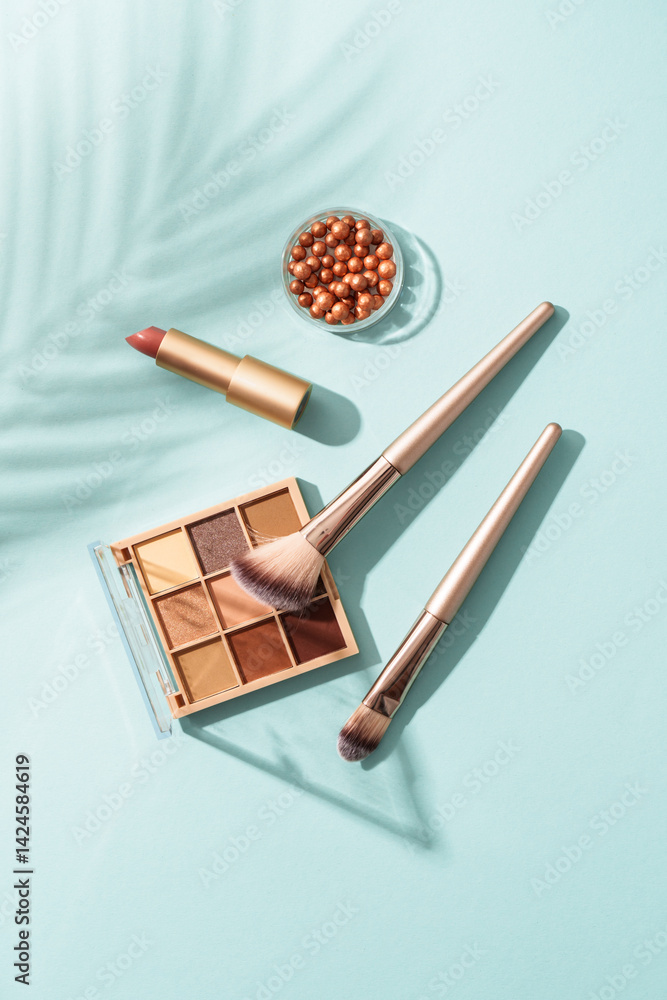 Make up products on blue background.