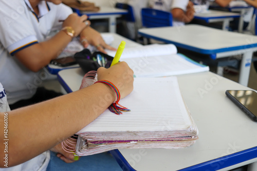 Obraz na płótnie Student at school in the classroom doing activity.