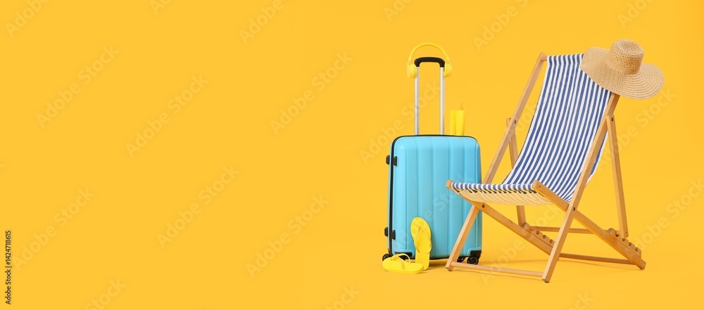 Fototapeta premium Deck chair, beach accessories and suitcase on yellow background with space for text. Summer vacation concept